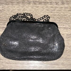 Cute black sparkly clutch. Also has a small strap (metal). Express brand.